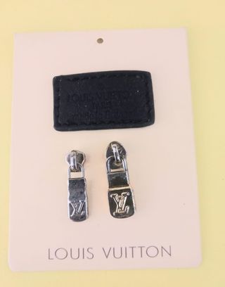Etiqueta y hebillas LV.todo 10€
