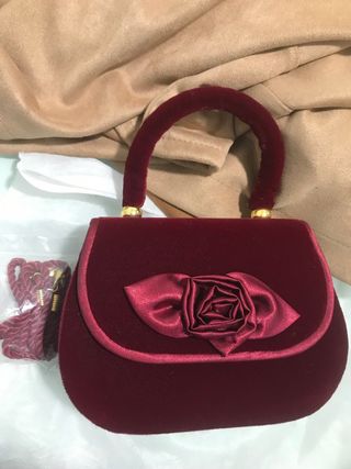 Bolso fiesta de tercio pelo burdeos