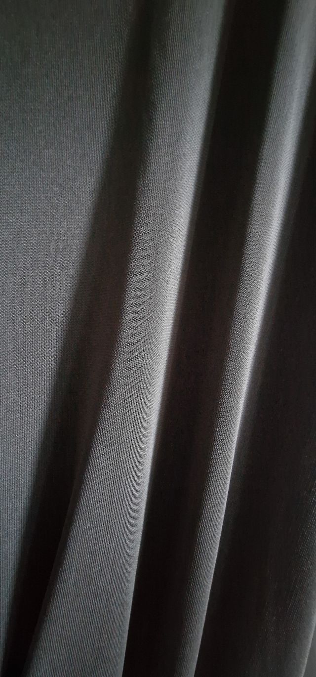 Tuta nera intera lucida da sera