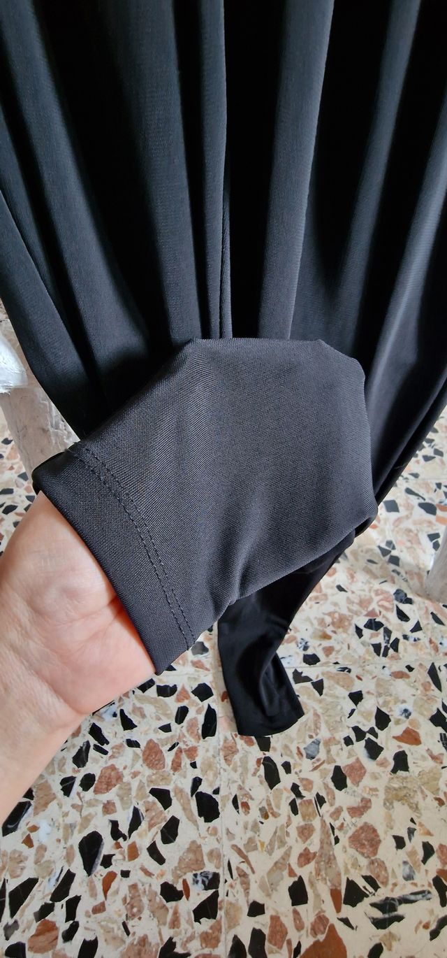 Tuta nera intera lucida da sera