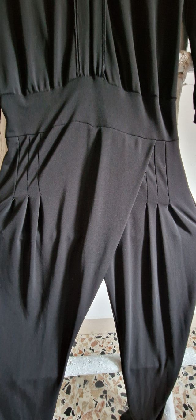 Tuta nera intera lucida da sera