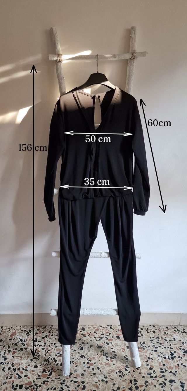 Tuta nera intera lucida da sera