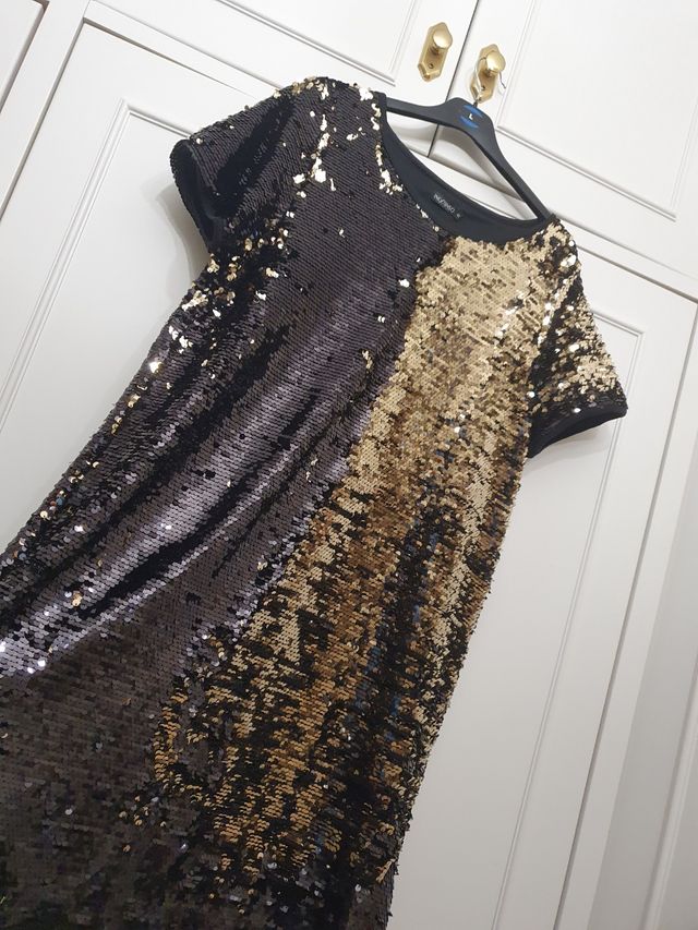 Vestido de lentejuelas en negro y dorado