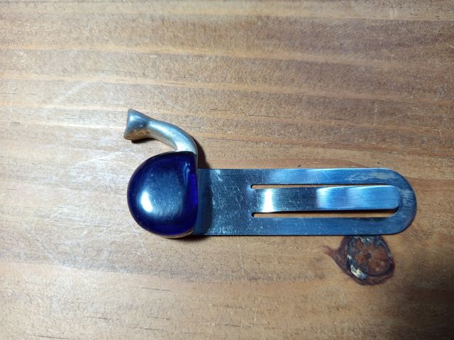 Figura portafoto y clip para billetes