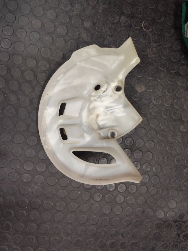 Protector disco freno honda cr