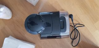 Cafetera eléctrica Tassimo con su caja