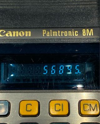 Calculadora Canon Palmtronic 8M con funda