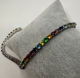 Pulsera riviere de oro de 18 kt con gemas