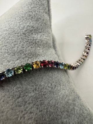 Pulsera riviere de oro de 18 kt con gemas