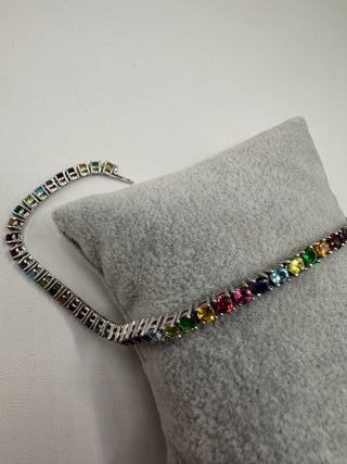 Pulsera riviere de oro de 18 kt con gemas