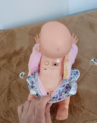 Bambolina con varie funzioni e suoni