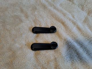 Manecillas elevalunas
