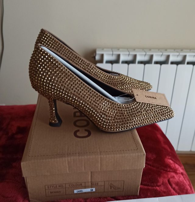 Elegante stiletto dorado joya nuevo #38