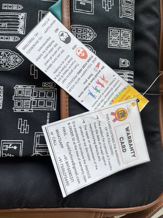 Cartera a estreno con etiqueta