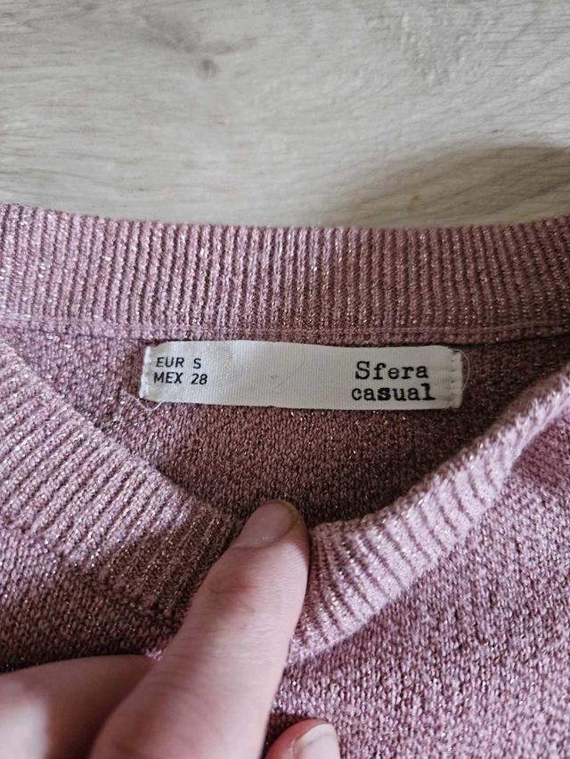 Jersey rosa con hombreras