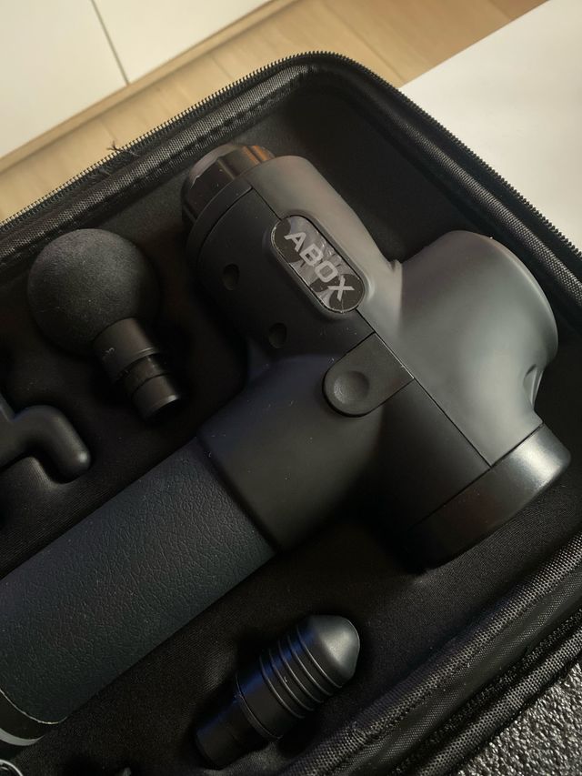 Pistola de masaje muscular Abox nueva