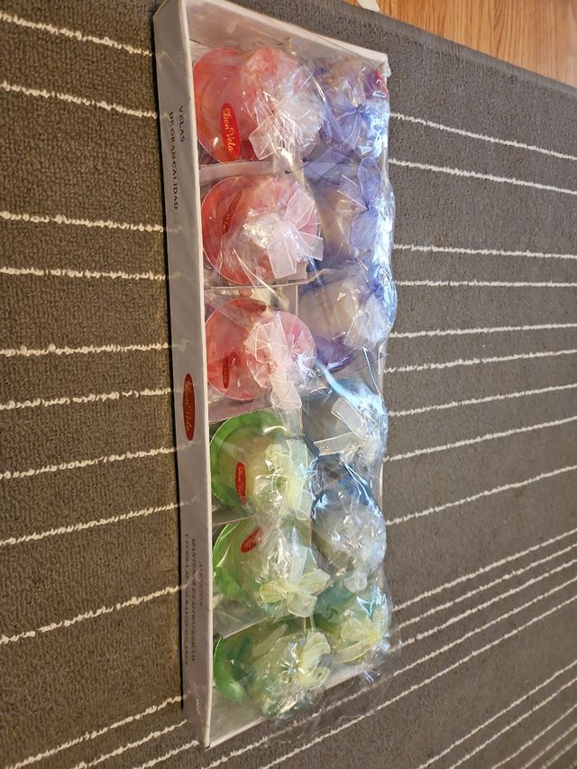 Juego 12 velas cin portavelas