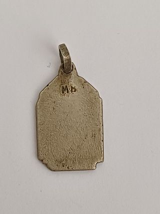 Antigua medalla religiosa de plata