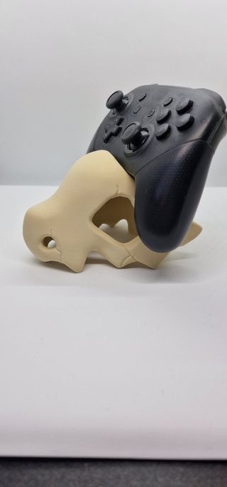 Soporte mando consola Cubone