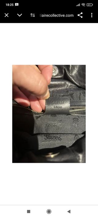 Bolso Gucci de mano negro charol