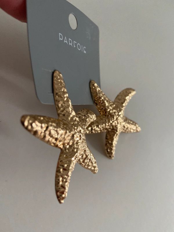 estrellas de mar pendientes mango