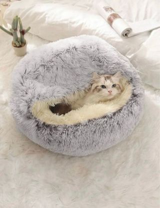 Cama redonda de peluche para