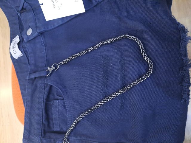 Jeans strappato blu uomo catena