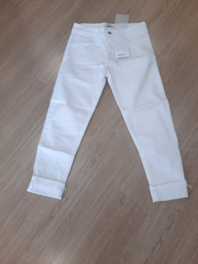Jeans bianco sagomato uomo bottoni