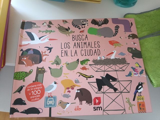 Busca los animales en la ciudad solapas