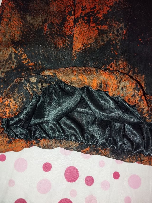 Blusa mujer negra y naranja