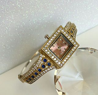 Reloj plata 925,oro y zafiros