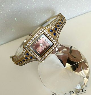 Reloj plata 925,oro y zafiros