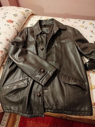 Abrigo de vuelta de muy buena calidad.