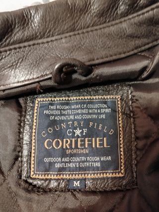 Abrigo de vuelta de muy buena calidad.