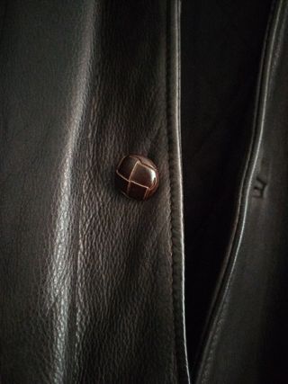 Abrigo de vuelta de muy buena calidad.