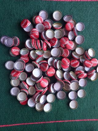 Más de 180 chapas cocacola