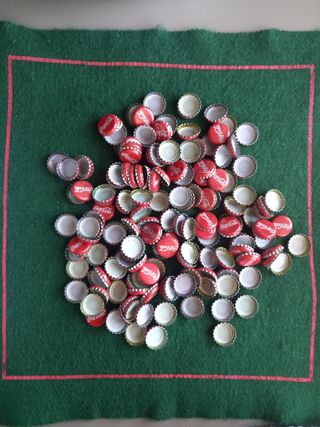Más de 180 chapas cocacola