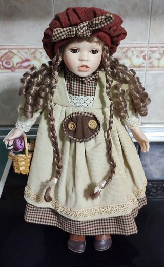 Muñeca de porcelana para expositor