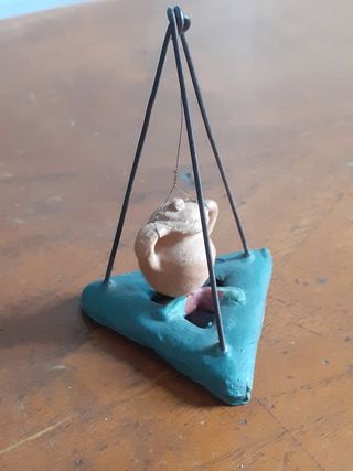 Figura pesebre barro hoguera