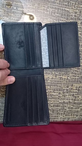 Cartera Skechers auténtica 