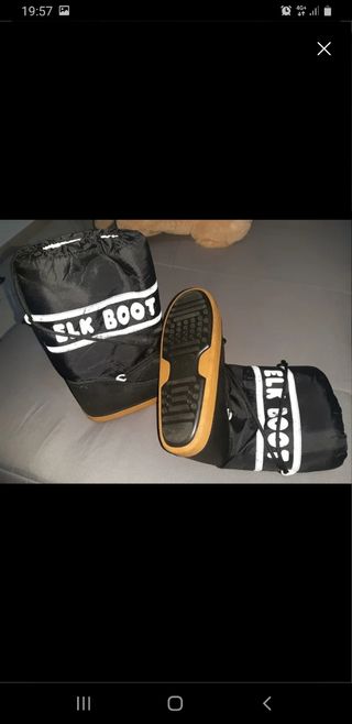 Salopette e scarponi neve