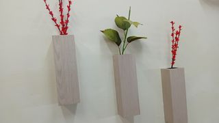 Tris di vasi a parete