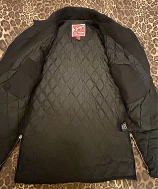 Cazadora motera negra efecto desgastado