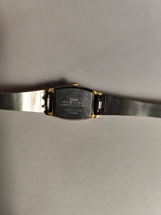 Reloj Titan oro