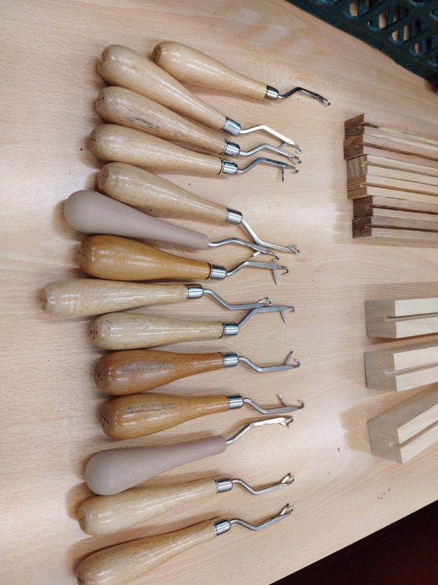 Agujas de coser alfombras y maderas de