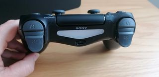 Playstation 4 Slim de 1Tb + mando + dos jue