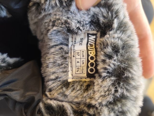 Botas negras impermeables cremalleras