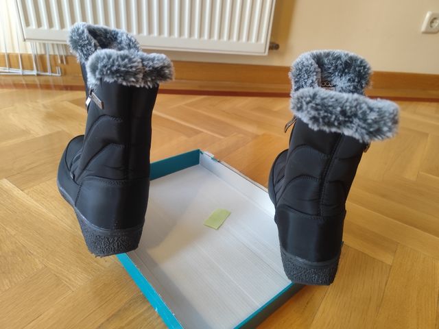 Botas negras impermeables cremalleras