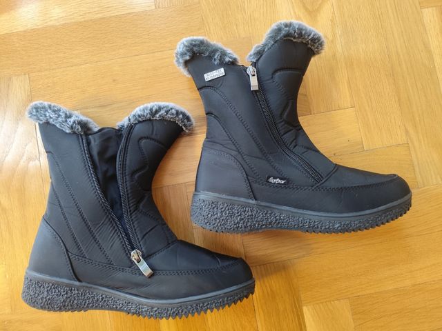 Botas negras impermeables cremalleras