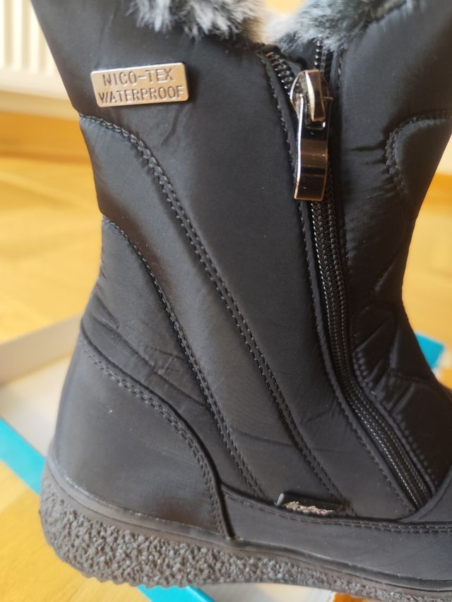 Botas negras impermeables cremalleras